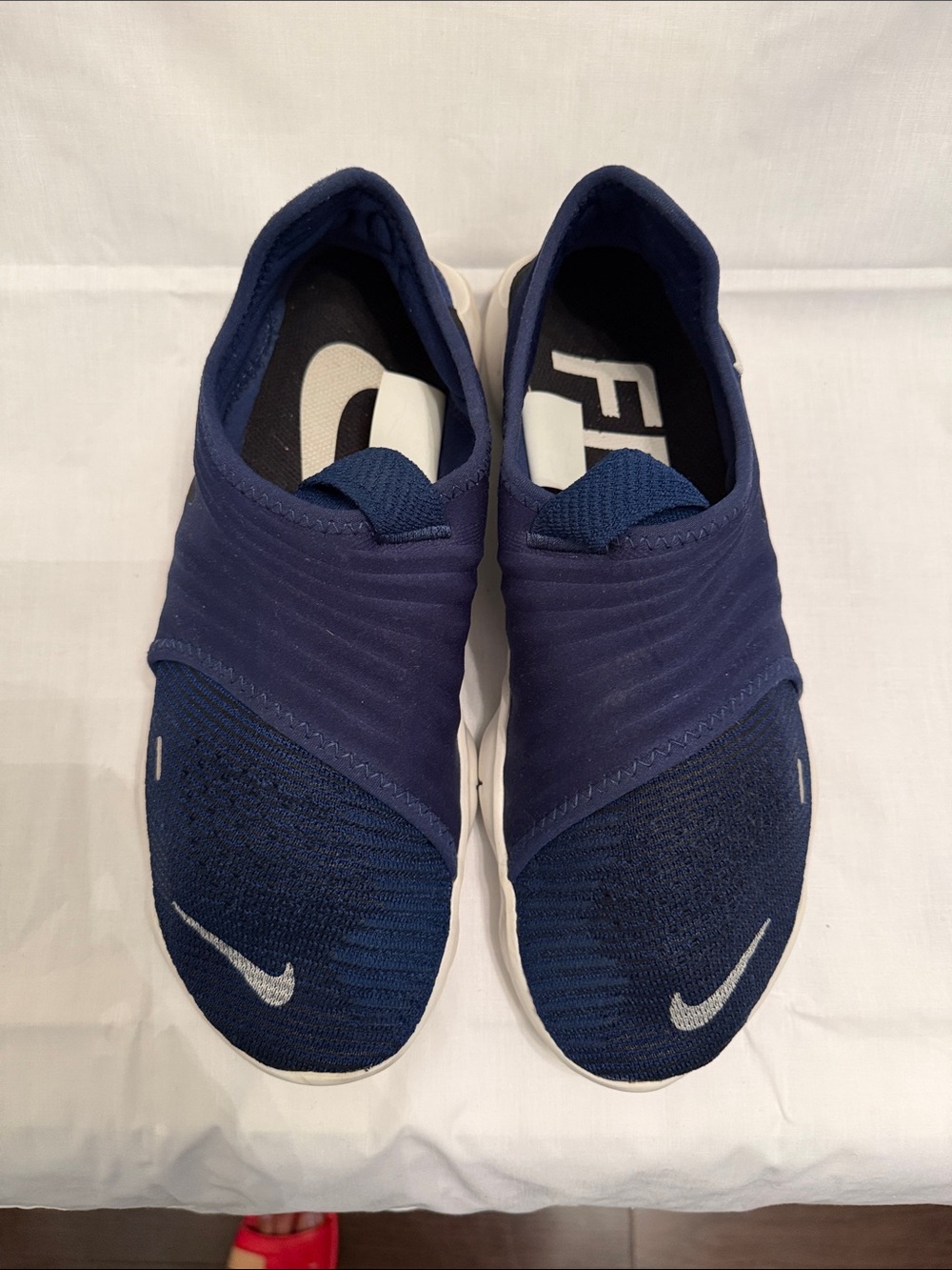 Nike Men’s Slip-On Sneakers in Navy and White